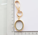 In Memory Gold Oval Locket Keyring. Mum Mother Loss